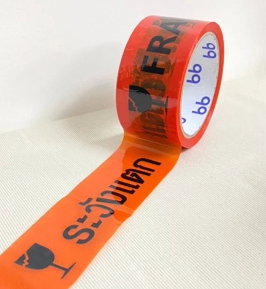 เทประวังแตก พื้นส้ม ตัวหนังสือดำ